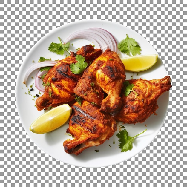 Plate of roasted chicken with lemon wedges on transparent background