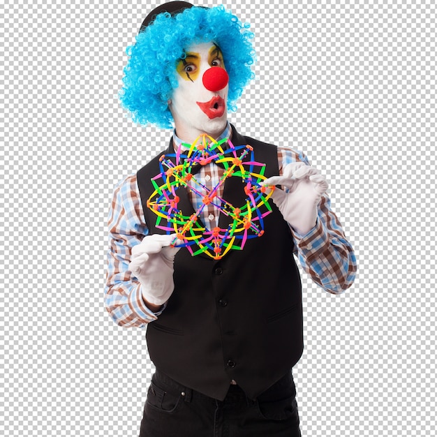 Portrait of a funny clown playing with a toy ball