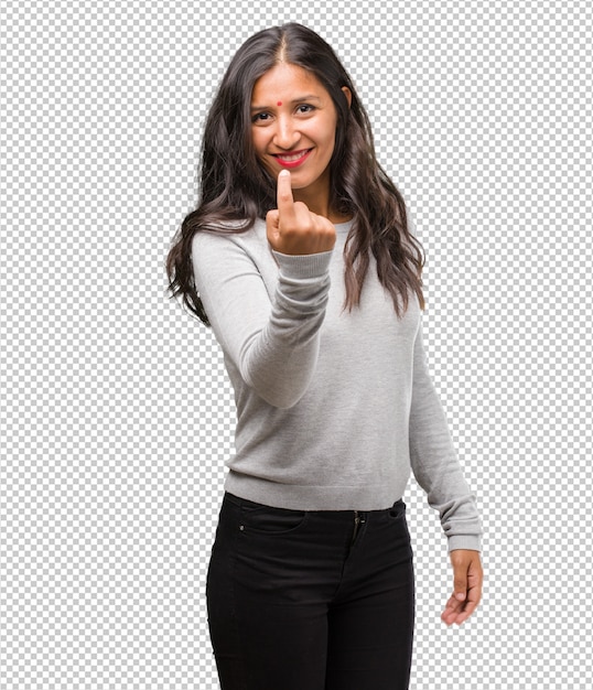 Portrait of young indian woman inviting to come, confident and smiling making a gesture with hand, being positive and friendly