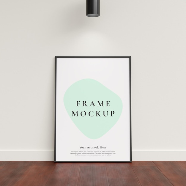 Poster photo frame mockup leanings against the white wall on wooden floor