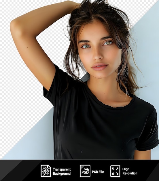 premium of beautiful young brunette in black t shirt keeps hand hair and looks toward while standing in front of a white wall with her brown hair and blue and brown eyes visible png