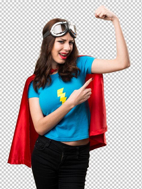 PSD pretty superhero girl making strong gesture