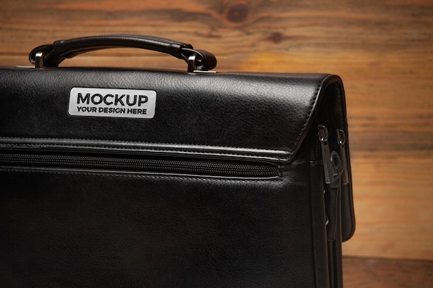 Professional black leather briefcase with branding