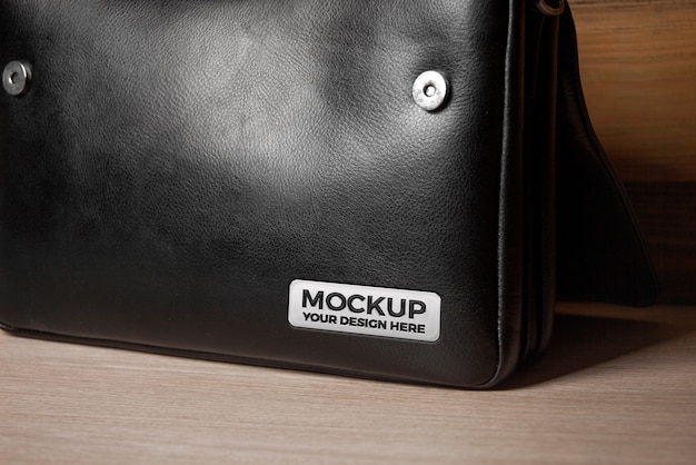 Professional black leather briefcase with branding