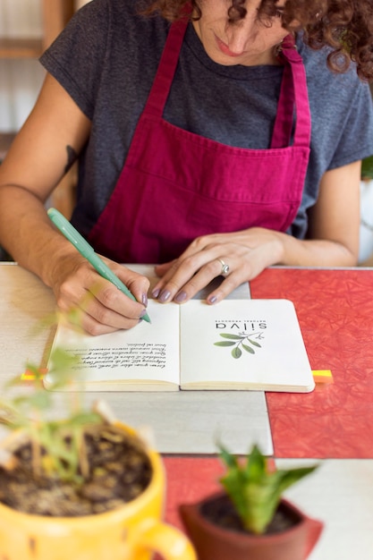 PSD professional gardener taking notes