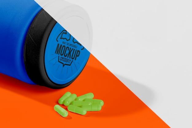 Protein blue bottle and green pills mock-up