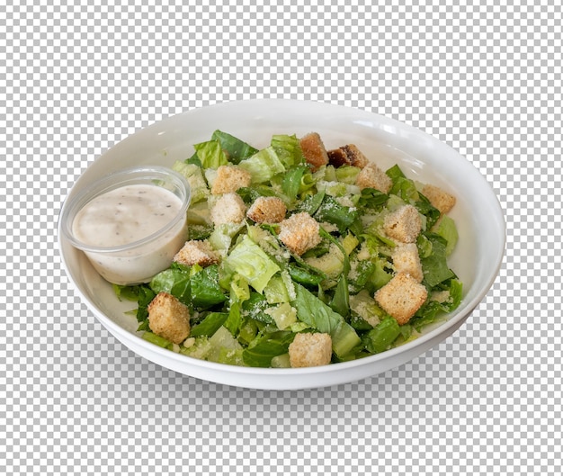 PSD A bowl of salad with caesar dressing in it isolated