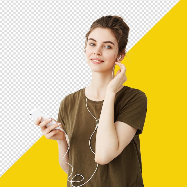 PSD a girl with ear buds in her ear and earphones in front of with transparent background