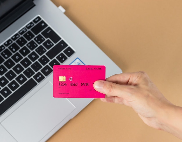 PSD mockup of credit card held in hand