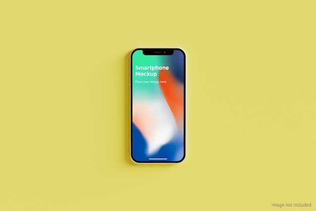 PSD smartphone mockup on color wall - top