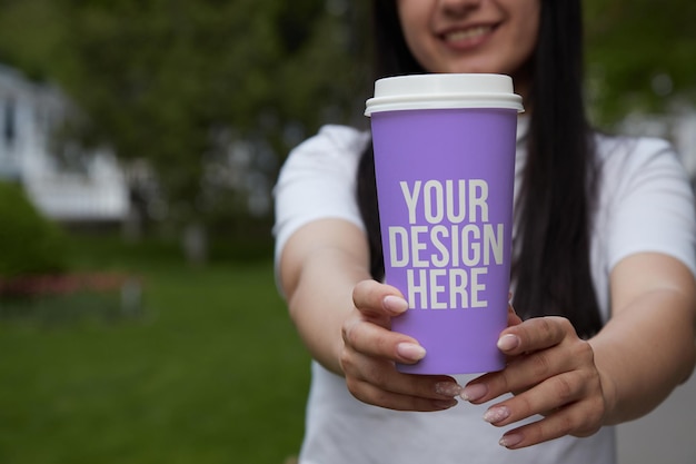 Purple coffee cup in hand mockup custom design changeable color closeup