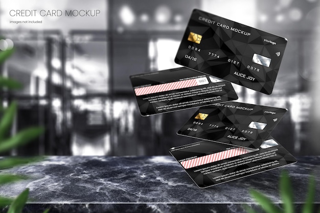 Realistic floating credit card mockup on black marble tabletop