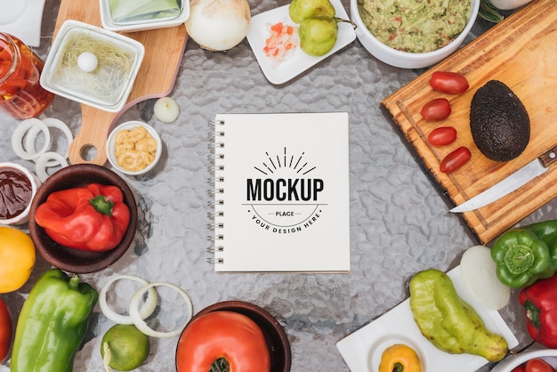 Recipe book mock-up surrounded by healthy food