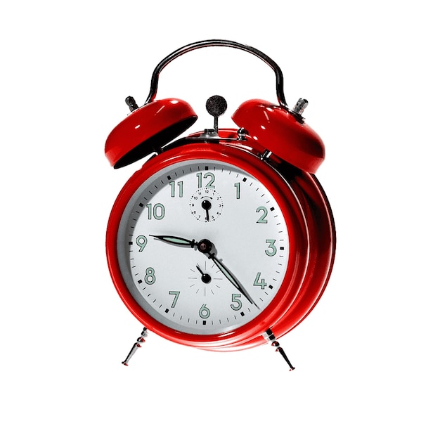 a red alarm clock with the time as 12 00