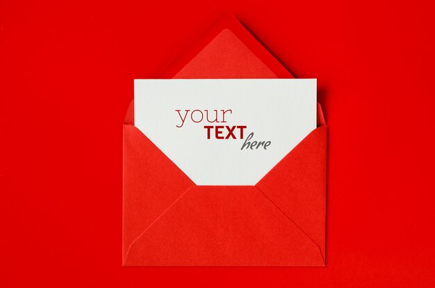 PSD red envelope with blank white paper. valentine's day background. mock up of love letter.