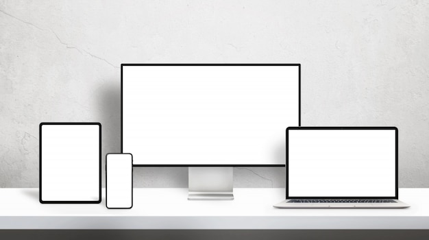 PSD responsive devices on desk with isolated screen for mockup on office desk