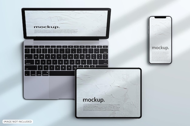 Responsive phone laptop tablet app screen device presentation mockup office work concept flatlay iso