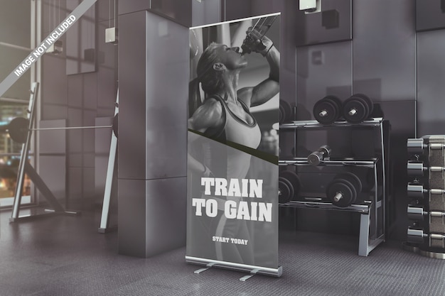 PSD roll-up standing banner in gym mockup