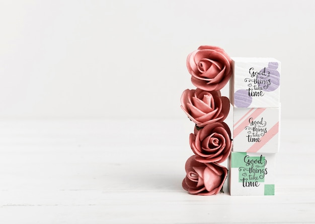 Roses and colorful blocks with copy space