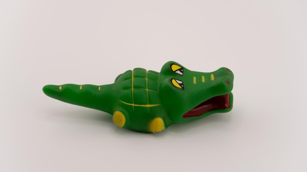 PSD rubber doll of a crocodile seen from the side transparent background