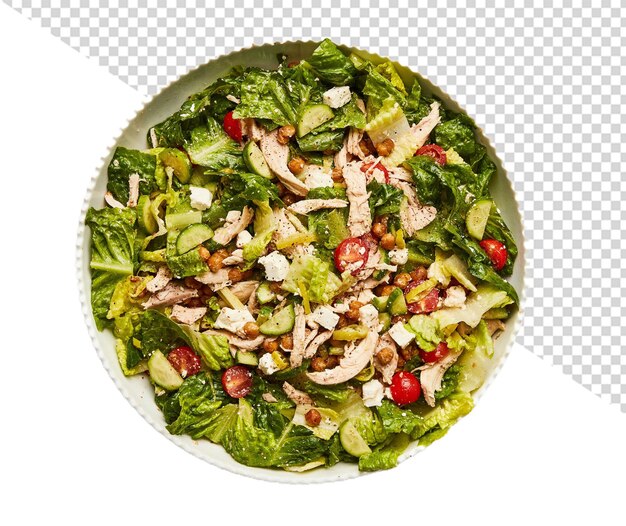 a salad with a white plate that has a red and green topping