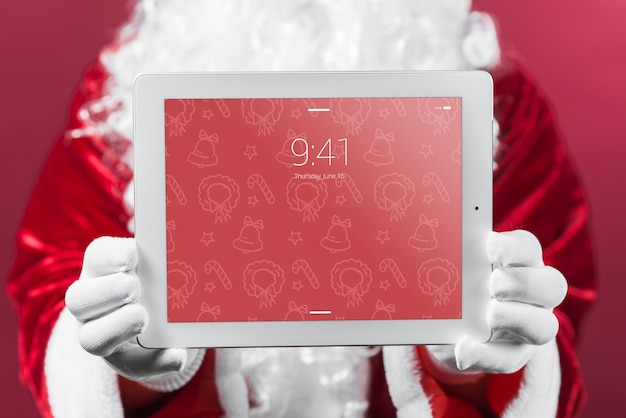 Santa presenting tablet mockup