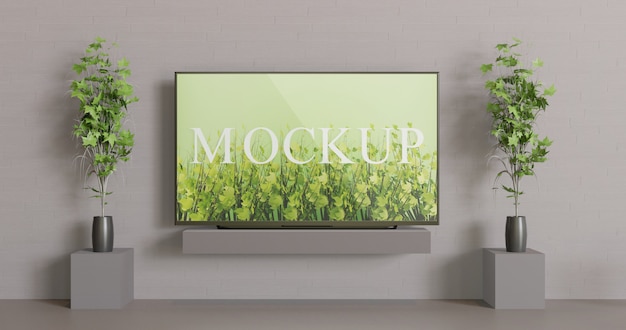 screen tv mockup on the table. front view screen mockup with couple decoration plants