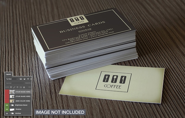 Simple business cards on wooden surface mockup