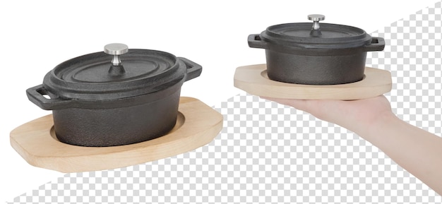 Small saucepan for serving food on a wooden stand. Isolated from the background