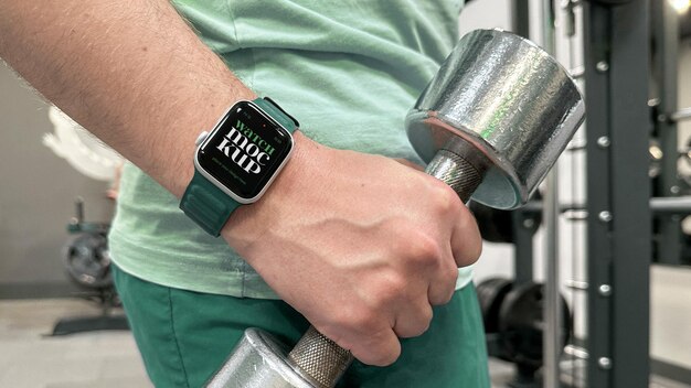 PSD smart watch mockup in gym with dumbbell psd template