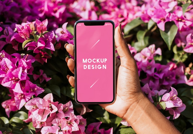 PSD smartphone mockup in floral background