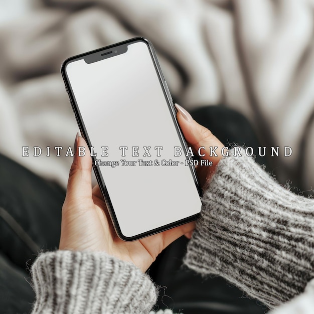 PSD smartphone mockup in hand with blank screen for app presentation