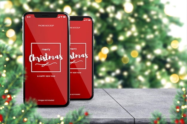 Smartphone mockup of two iphone 13 on bright Christmas background