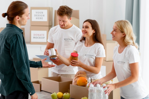 Smiley volunteers handing out food donations