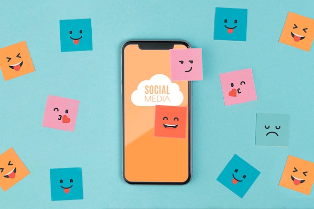 Social media concept with smartphone and sticky notes