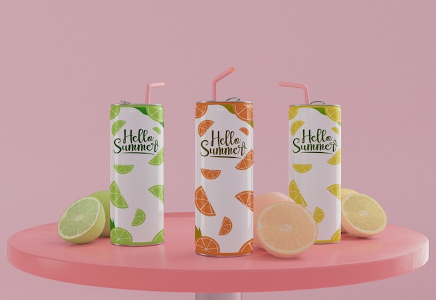 Soda cans on table with pink background