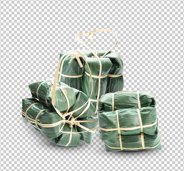 Sour pork wrapped in banana leaves isolated on white background