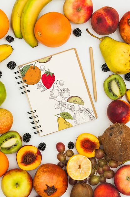 Spiral notebook mockup with fruits