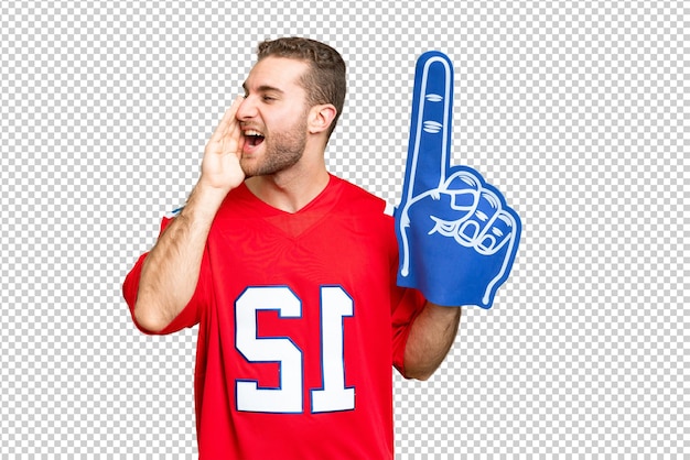 PSD sports fan man over isolated chroma key background shouting with mouth wide open to the side