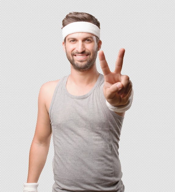 Sporty man making peace sign