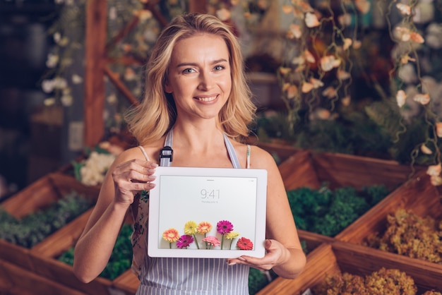 Spring concept with woman holding tablet mockup