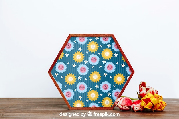 Spring mockup with hexagonal frame of flowers