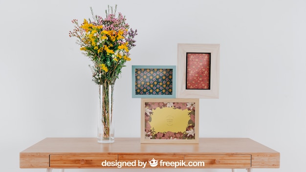 Spring mockup with three frames over table