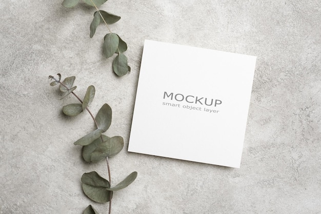 Square blank paper card mockup with copy space and botanical decor