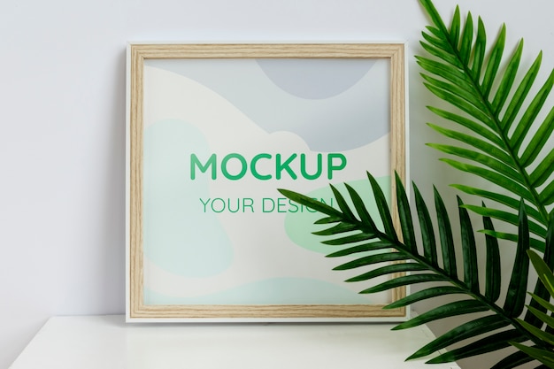 Square wooden frame mock-up with interior decorations