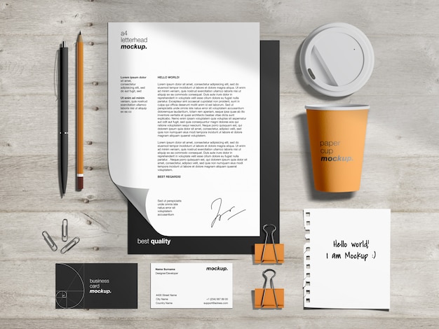 PSD stationery branding identity mockup template and scene creator with letterhead, business cards, paper coffee cup and torn paper note