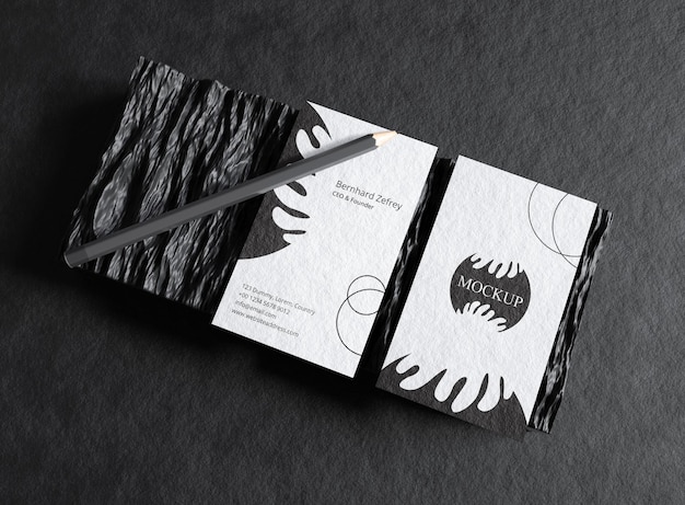 Stationery mockup on black business card with pencil