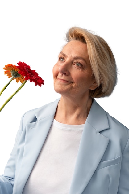 PSD studio portrait of elderly woman with daisy flowers