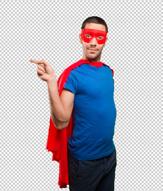 Surprised superhero pointing