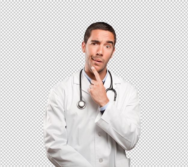 Suspicious doctor against white background